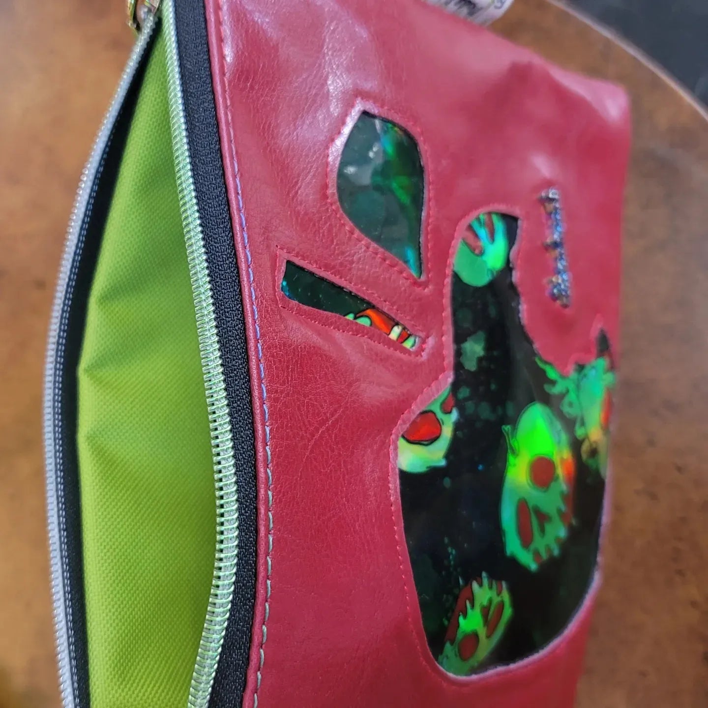 Poi$on @pple Wristlet
